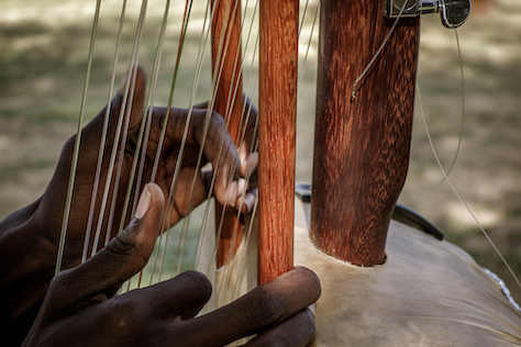 Man playing the kora